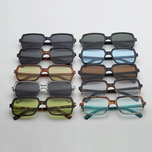 Flat lay display of 10 different colors of stylish large frame square sunglasses
