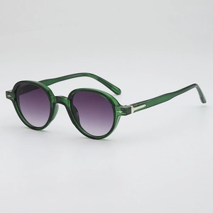 Retro round sunglasses with translucent green frames and purple gradient lenses