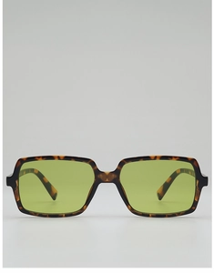 Detail of vintage tortoise shell rectangle frame sunglasses with green tinted lenses