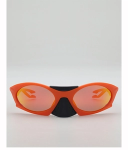 Close-up of polarized orange sports sunglasses with streamlined frame and anti-slip pads