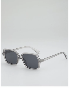 Close-up of translucent grey square frames and premium dark lenses with sizing detail