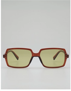 Detail view of oversized rectangular sunglasses with transparent brown resin frames