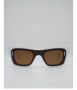 Close-up of square white frame sunglasses with silver stud accents and brown lenses
