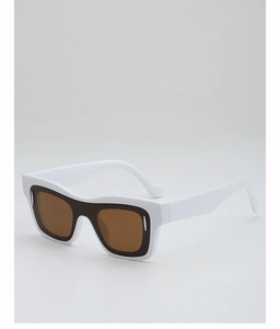 Detail of retro white square frame sunglasses with silver hinge accents and brown lenses