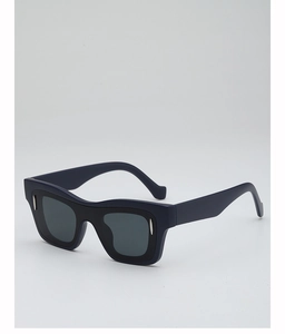 Close-up of deep blue matte square frames with silver teardrop accents on sunglasses