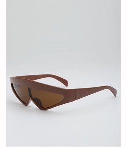 Vue latérale de lunettes de soleil futuristes marron avec monture monobloc en résine