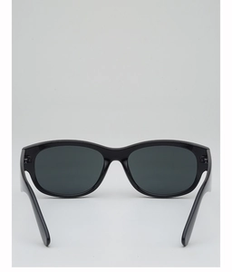 Rear view of sleek black retro sunglasses showing sturdy frame and dark tinted lenses