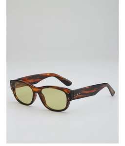 Detailed side view of vintage tortoise shell frame sunglasses with metallic rivets