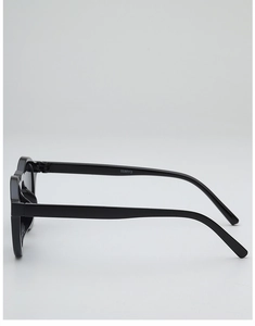 Detailed side view of black glossy sunglasses showing the CA2833 model code on the temple