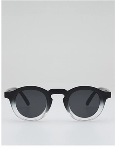 Front view of retro round sunglasses with black-to-clear gradient frames and dark grey lenses