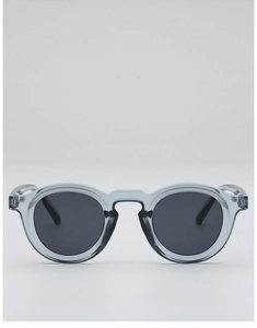 Detailed view of retro round frame sunglasses in translucent blue with dark polarized lenses
