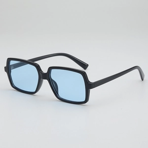 Classic thick black square frame sunglasses with light blue lenses for a retro summer look