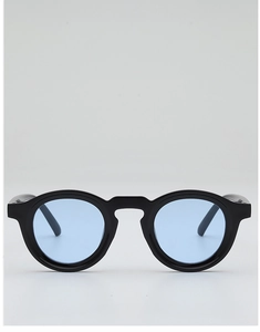 Detailed front view of retro round black frames with light blue tinted lenses