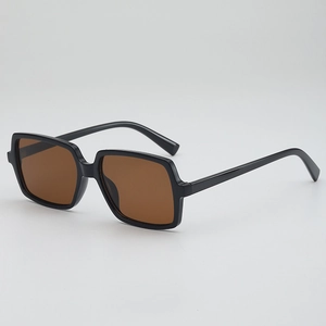 Classic oversized square sunglasses with black frame and brown lenses at a 45-degree angle