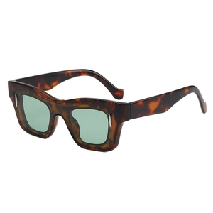 Retro square tortoiseshell sunglasses with green lenses and silver accents in 45-degree view