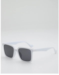 Detail view of large white square sunglasses featuring unique wavy temple design and dark lenses