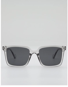 Detail view of transparent grey oversized square sunglasses with dark grey lenses