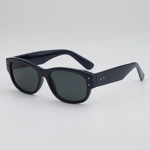 Retro small frame sunglasses with deep blue resin frame and silver stud detailing