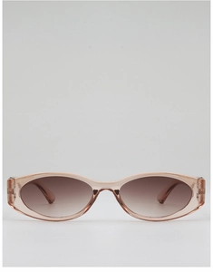 Detail of oval pink transparent frame sunglasses with stylish brown gradient lenses