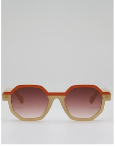 Front view of geometric hexagonal sunglasses with orange and beige frame and gradient lens
