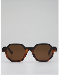 Detailed front view of geometric polygon sunglasses in stylish tortoise shell frame