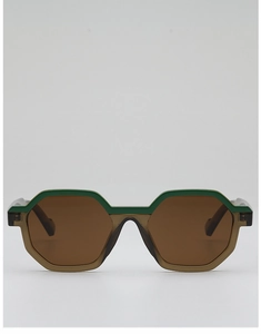 Front view of geometric octagonal sunglasses with green and amber two-tone frames