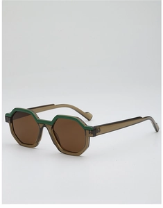 Detail of hexagonal sunglasses featuring brown transparent frames with green accents