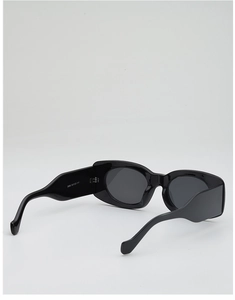 Detail view of wide-leg black thick frame sunglasses with internal model number 3988