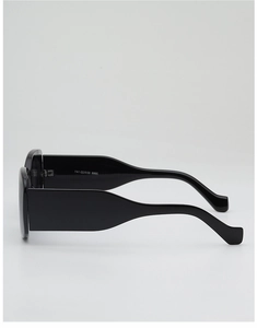 Detail shot of wide rectangular frame sunglasses showing model number 3880 and size 55-141