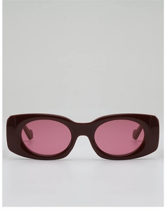 Detailed front view of 90s vintage wide frame sunglasses in deep wine red finish