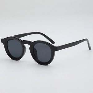 Modern retro round frame sunglasses with dark grey lenses in a minimalist black style