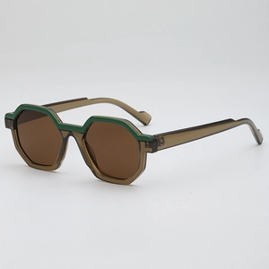 Retro polygon sunglasses with translucent tea frames and green geometric accents