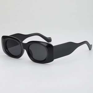 Y2K style thick oval sunglasses with unique wavy temples in glossy black finish