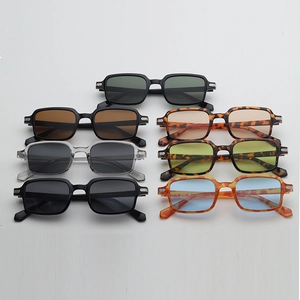 Detailed view of various colorful ocean-tint lenses and vintage square frame sunglasses