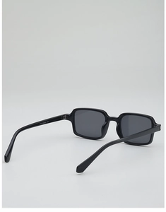 Detail view of vintage black rectangle sunglasses showing printed frame specifications