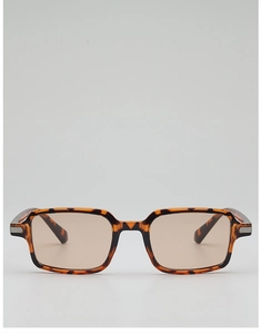 Detail of vintage tortoise shell rectangular frames with silver metal hinge accents