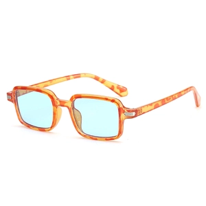 Retro tortoise shell sunglasses with blue lenses at a 45-degree angle view