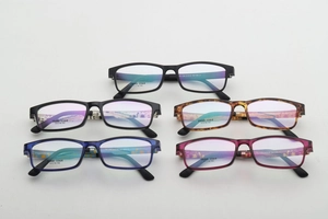 Stacked rectangular TR90 glasses in five assorted matte and tortoiseshell patterns