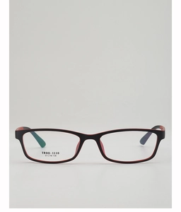 Detail of square glasses frame showing black and red contrast with TR90 material marking
