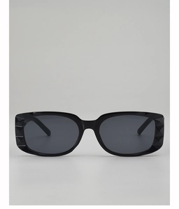 Detailed macro view of black square sunglasses with geometric pyramid-textured temples
