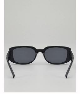 Detail view of wide temples and metal hinges on high-end black square frame sunglasses