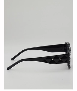 Detailed side view of black square sunglasses with textured temples and silver rivets