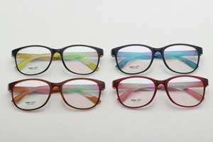 Flat lay of TR90-1147 round glasses frames in various colors with size specifications