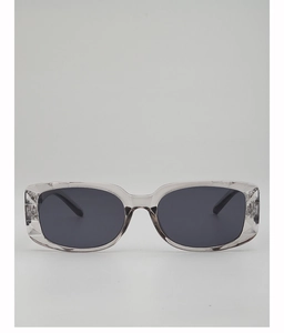 Detailed macro of translucent grey rectangular frame with diamond-cut faceted texture