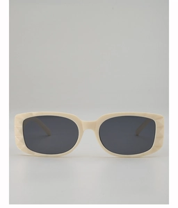 Detail view of cream white square sunglasses showing quilted texture on the side temples