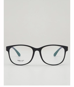 Close-up of black TR90 round frames with teal blue inner temple tips and model text