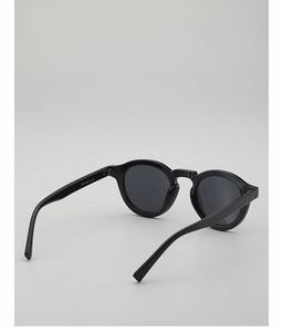 Detailed view of black round sunglasses frame showing hinges and temple size markings