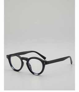 Detail view of round black frame glasses featuring stylish silver rivets and glossy finish