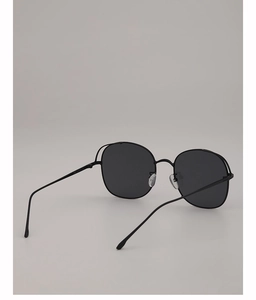 Detailed close-up of matte black metal sunglasses frame with inner temple specifications