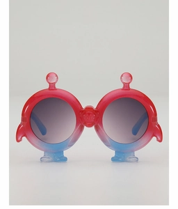 Close-up of kids monster sunglasses with red blue gradient frame and glitter texture